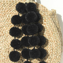 Load image into Gallery viewer, Luna Bag - Round Straw Tote Bag with Black Tiered Pom-poms
